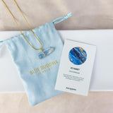 Kyaniet ruwe steen ketting goud