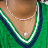 Rozenkwarts ruwe steen ketting goud