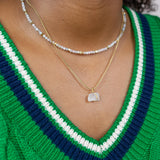 bergkristal ruwe steen ketting goud